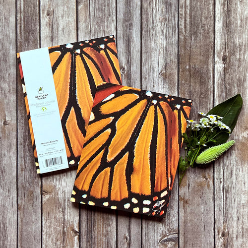 New Leaf Paper stacked Photoreal Journals featuring cover photography of Monarch butterfly wings